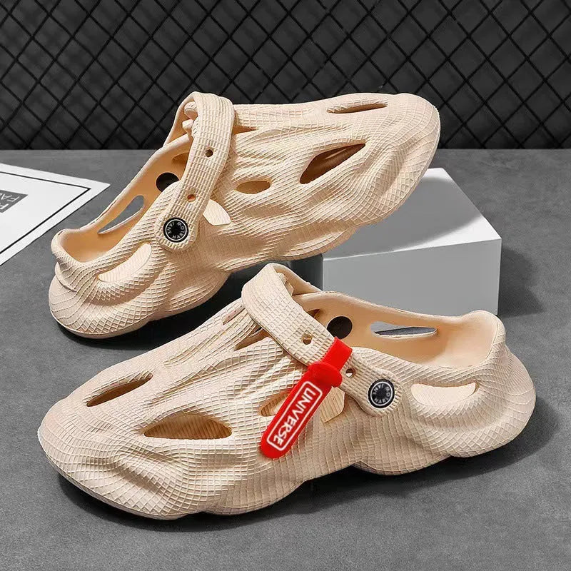 Pair of solid grey closed-toe EVA coconut slippers on a white background.