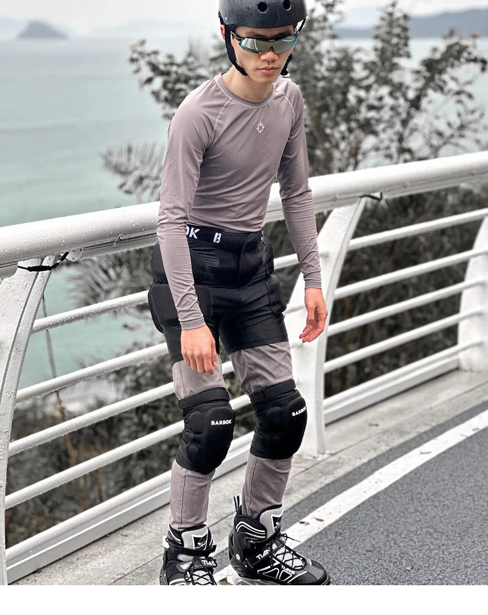 Black protective hip pad made of spandex and NBR foam for skating and skiing safety.