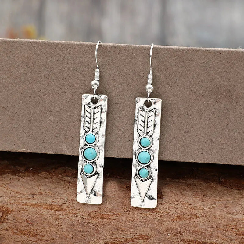 Silver geometric earrings with turquoise inlay on long strip design, retro style women's jewellery