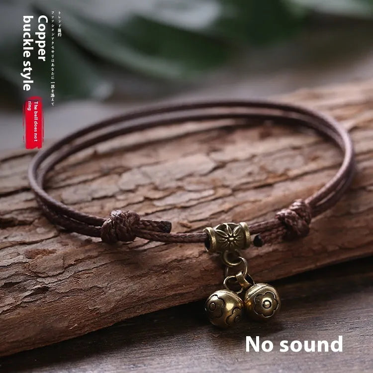 Nylon rope dog collar with a brass bell, shown in black, red, and coffee colour options.