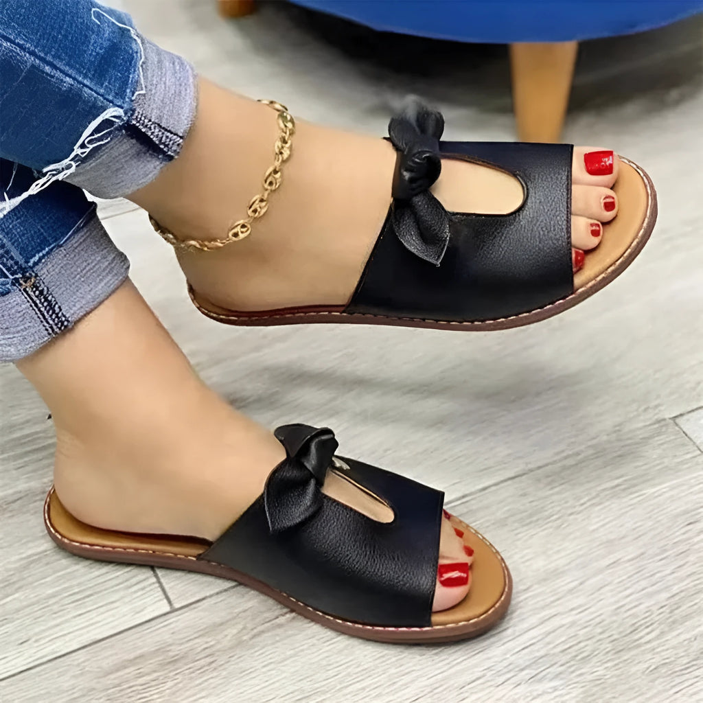 Women's sandals with bow decoration and fish mouth slipper design in black, pink or gold colours