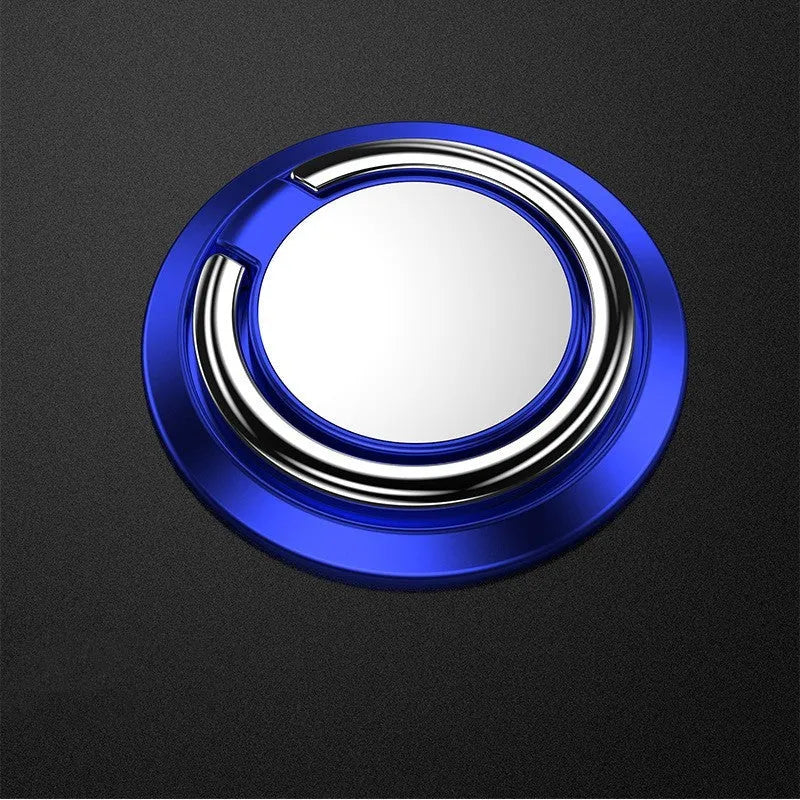 Magnetic suction ring car phone holder in black on car dashboard holding a smartphone