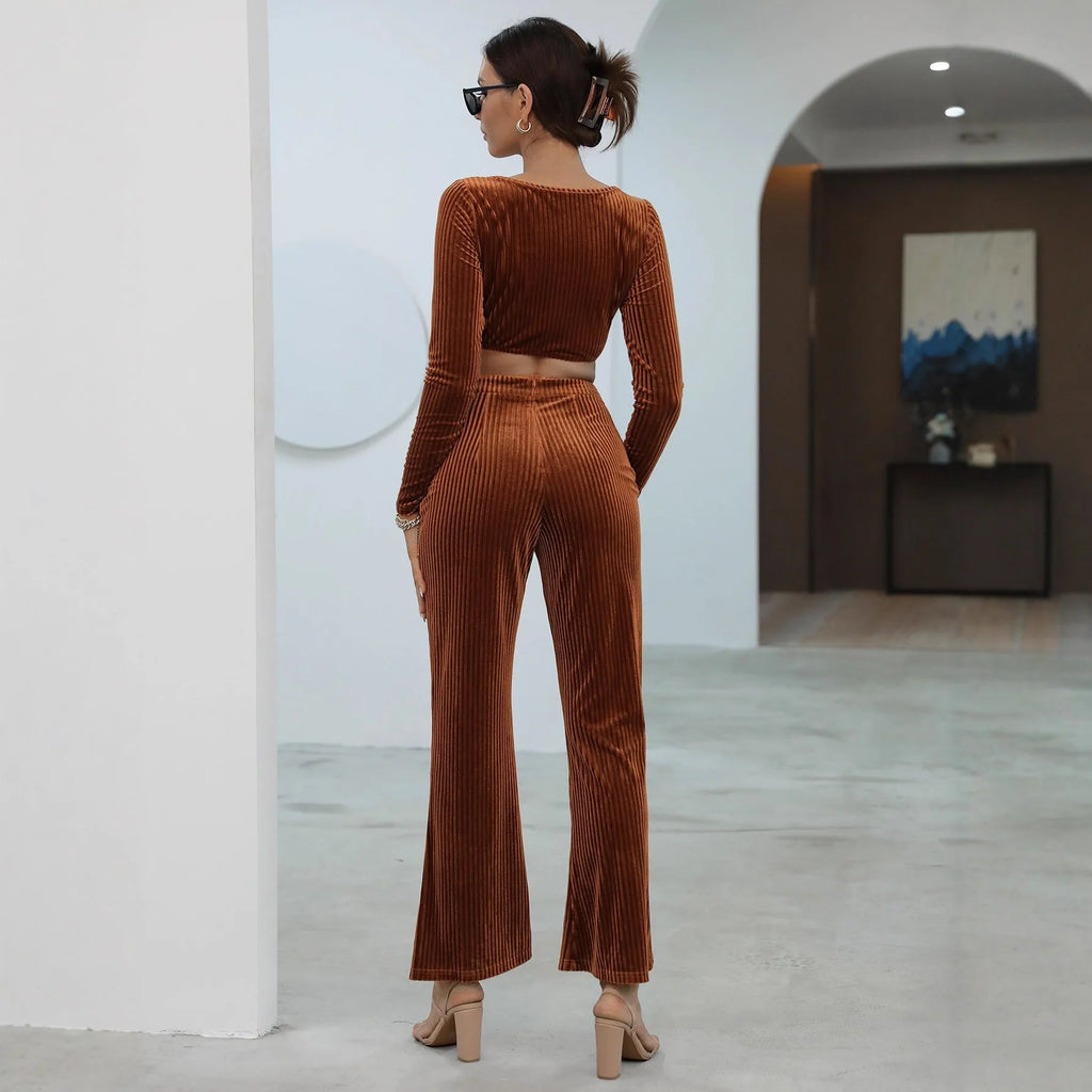 Caramel coloured long sleeve sweater and trousers casual set on a hanger