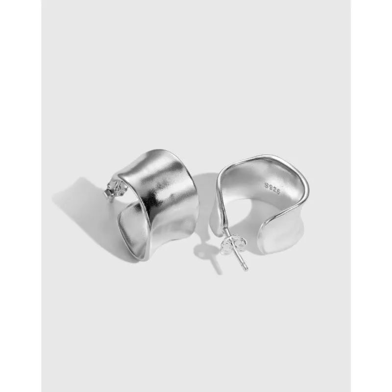 Pair of 925 silver women's ear studs with a wide irregular curved shape, 12 x 17.5mm, silver colour