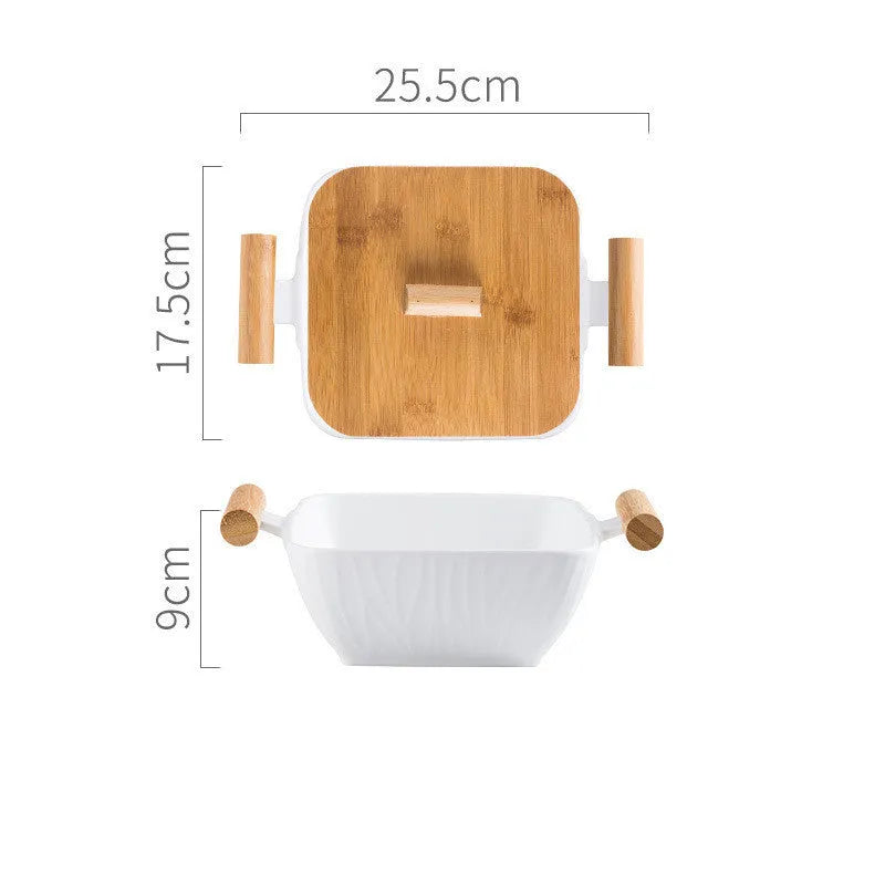 Porcelain ceramic bowl with irregular shape and matching lid in modern simple design