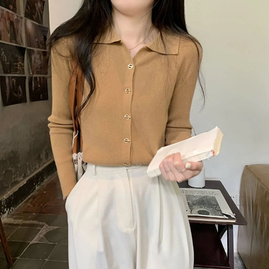 Long-sleeve loose-fit viscose knitted cardigan top in oatmeal colour.