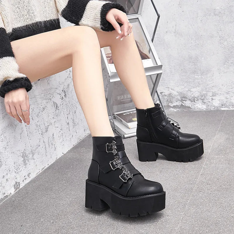 Black women's punk style Martin boots with a side zipper and thick heel.