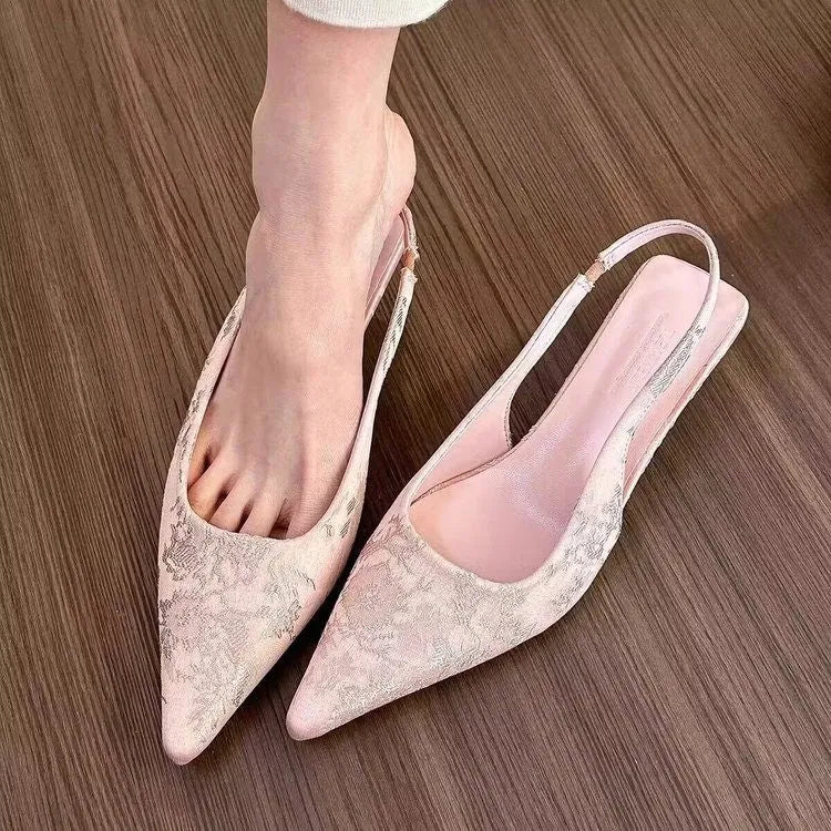 White faux suede mid heel stiletto court shoes with Mary Jane strap, pointed toe, and rubber sole, sizes 35-39