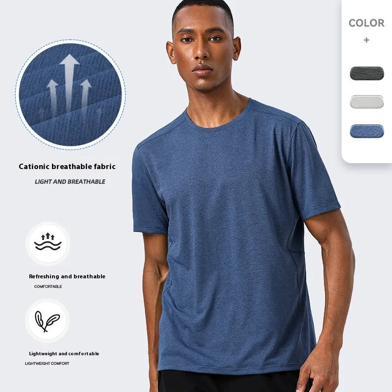 Adult short sleeve sports t-shirt in lightweight polyester, shown in dark grey, with reflective detail.