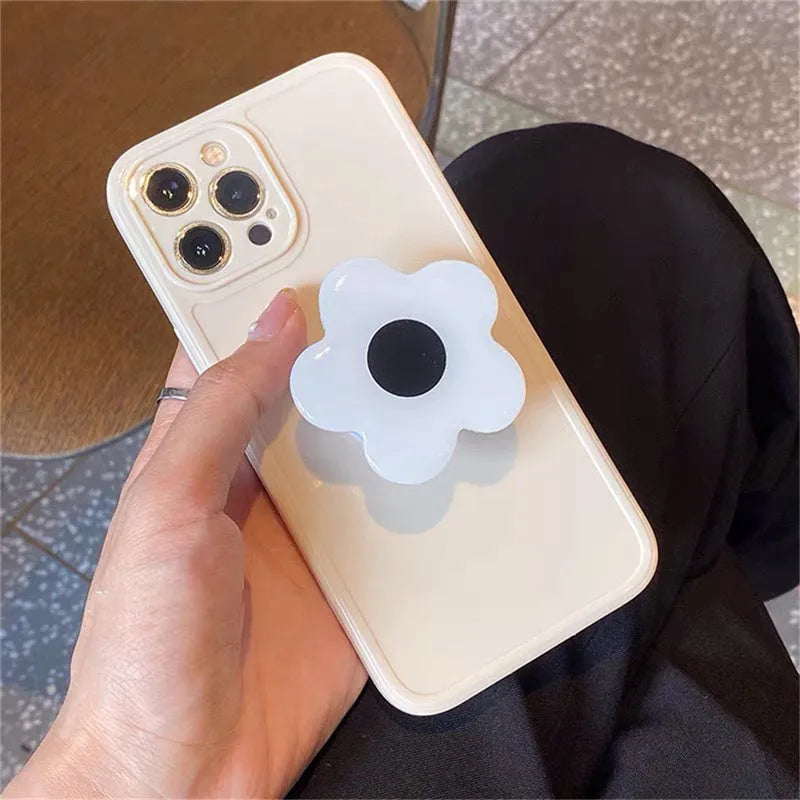 Cute flower phone case in pink or white for iPhone models including XR, XS, 11, 12 and 13