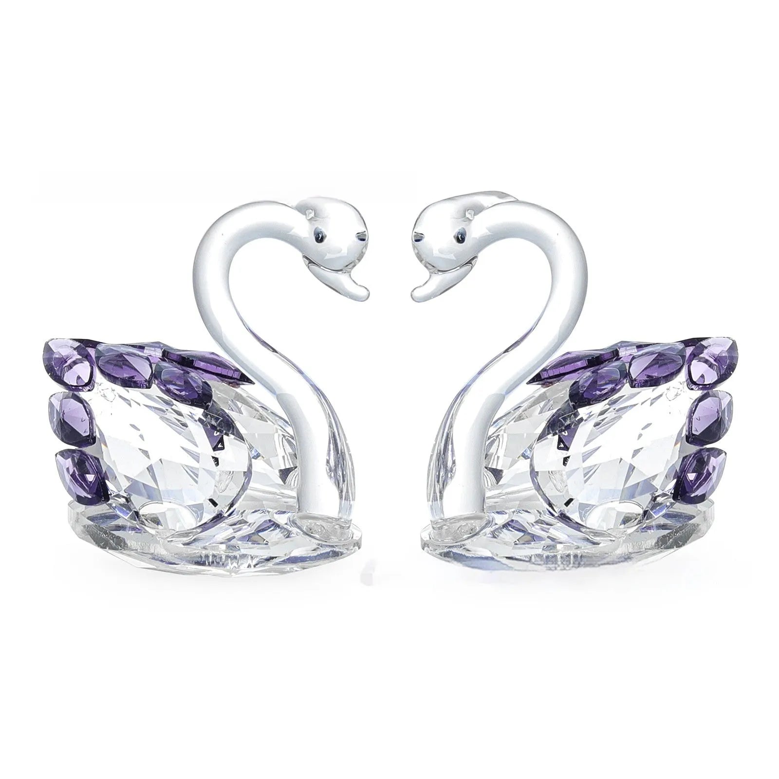Modern white crystal swan decoration on a desk, available in red, blue, pink, and purple.