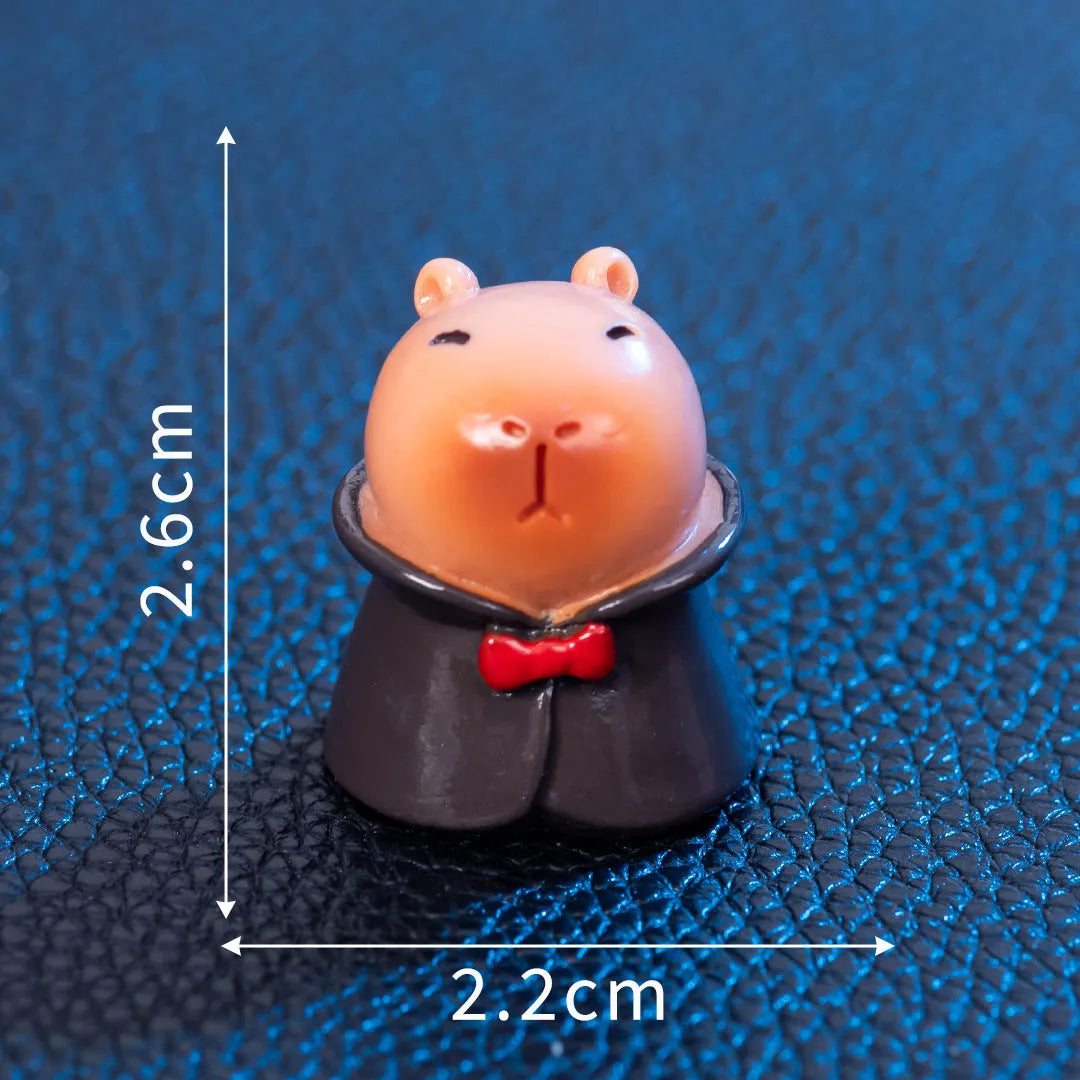 Halloween capybara resin figurine in one of eight designs like pumpkin or vampire.