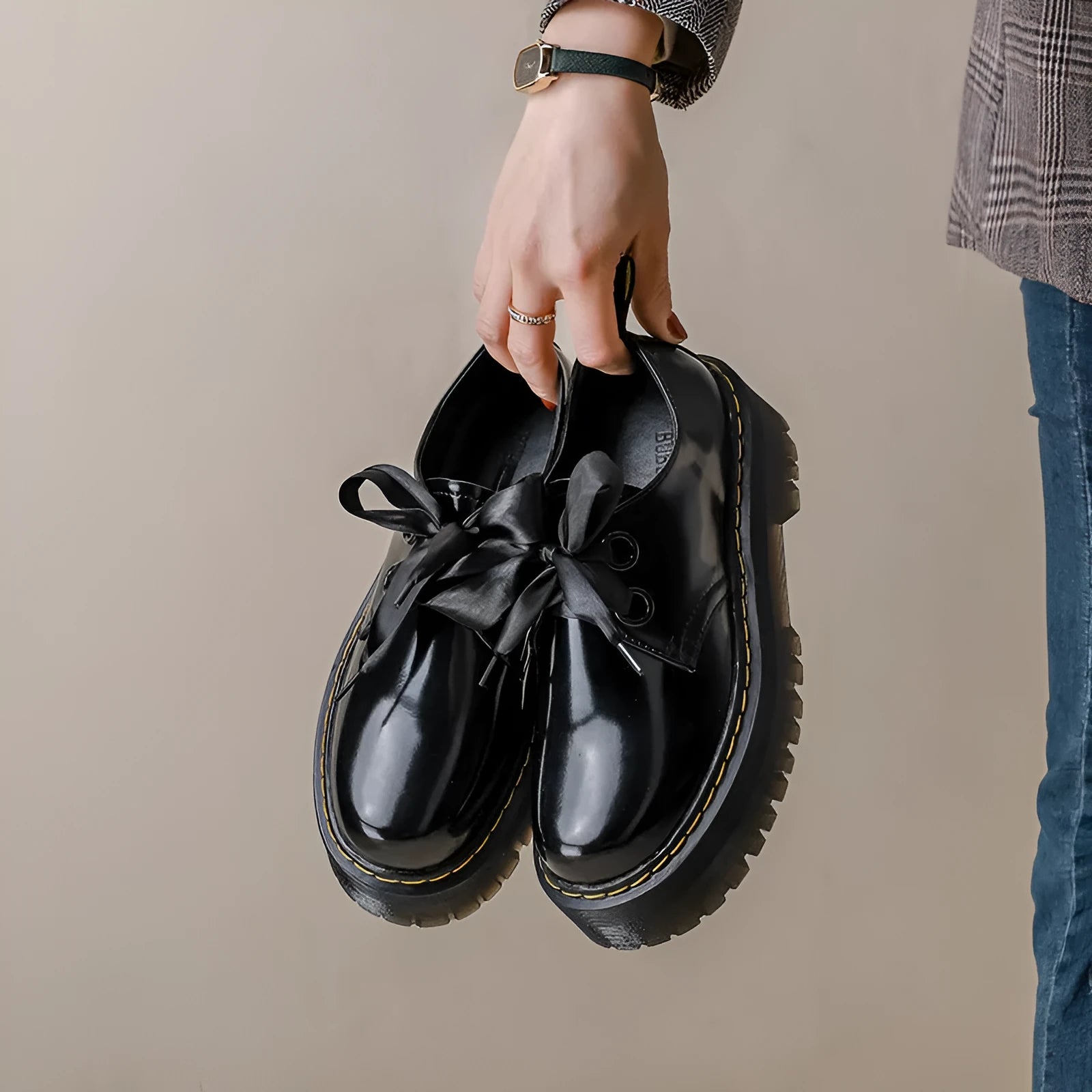 Black women's thick-soled lace-up shoes with ribbon detail on a superfine fibre upper.