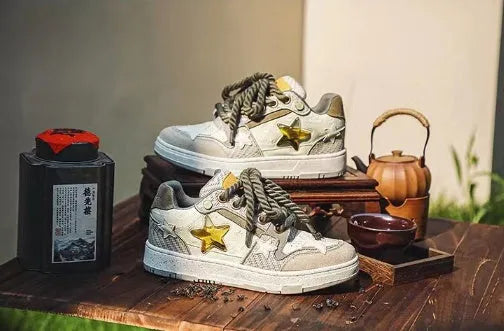 Green casual shoes with star pattern, multi-material stitching and lace-up closure