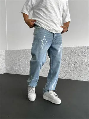 Men's blue straight-leg denim jeans with mid waist and zipper fly on solid background