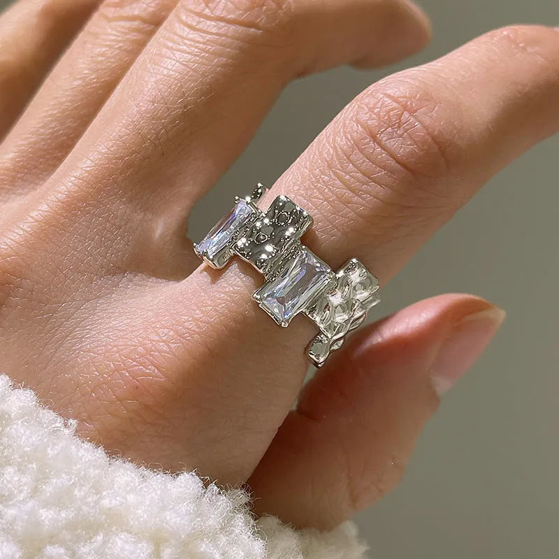 Silver open ring with cross zircon design and geometric retro styling