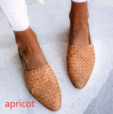 Women's flat sandals with a buckle strap and pointed toe in multiple colour options on a white background.