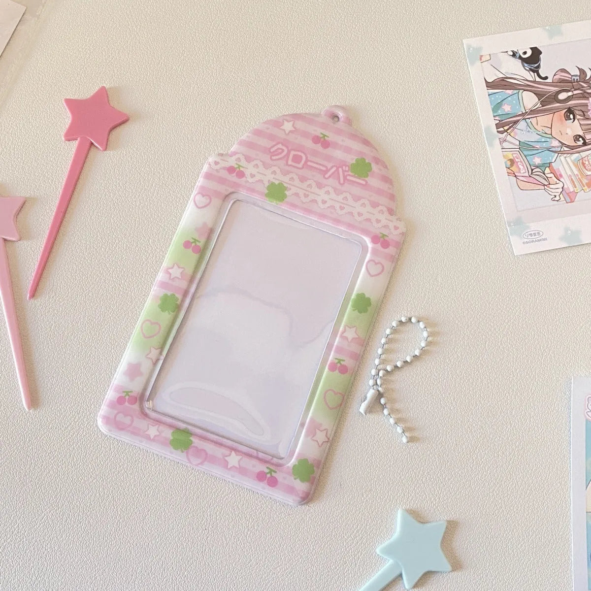 Cartoon plaid PVC card holder pendant in strawberry and four-leaf clover styles for 3-inch cards.