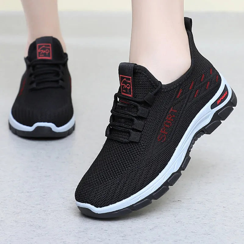 Men's and women's low-top casual sneakers with round toe and soft PVC sole in multiple colours.