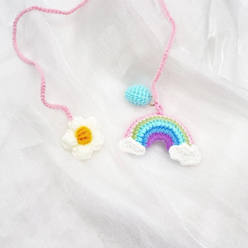 Handmade crocheted wool car pendant with rainbow flower pattern and cartoon avocado design in three colour options
