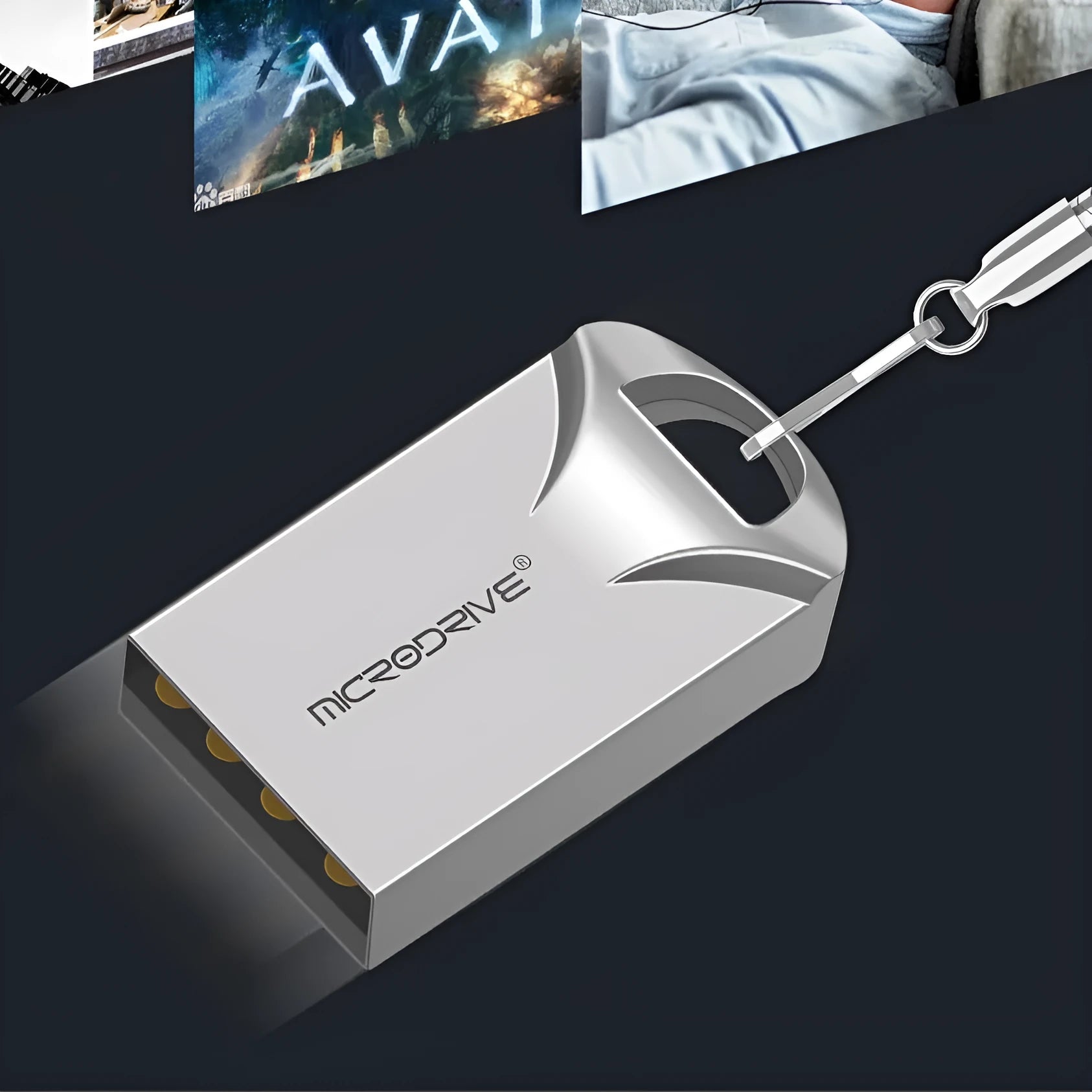 Small black and silver metal USB flash drive on a white background showing its compact size.