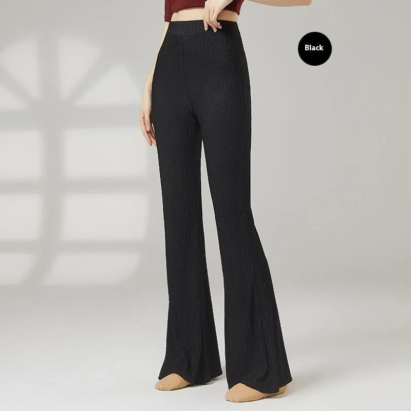 Women's solid colour polyester dance training pants shown in beige apricot, fit for sports dance practice.