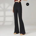Women's solid colour polyester dance training pants shown in beige apricot, fit for sports dance practice.