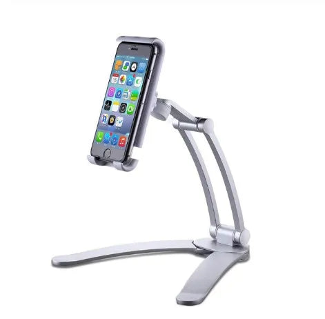 Silver aluminum alloy desktop stand holding a tablet at an angle, showing its adjustable clip and 360-degree rotation base.