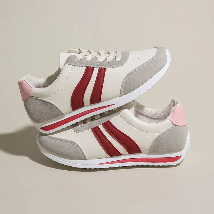 Blue lace-up leisure sneaker with low top design and round toe on rubber sole