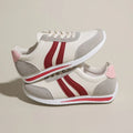 Blue lace-up leisure sneaker with low top design and round toe on rubber sole