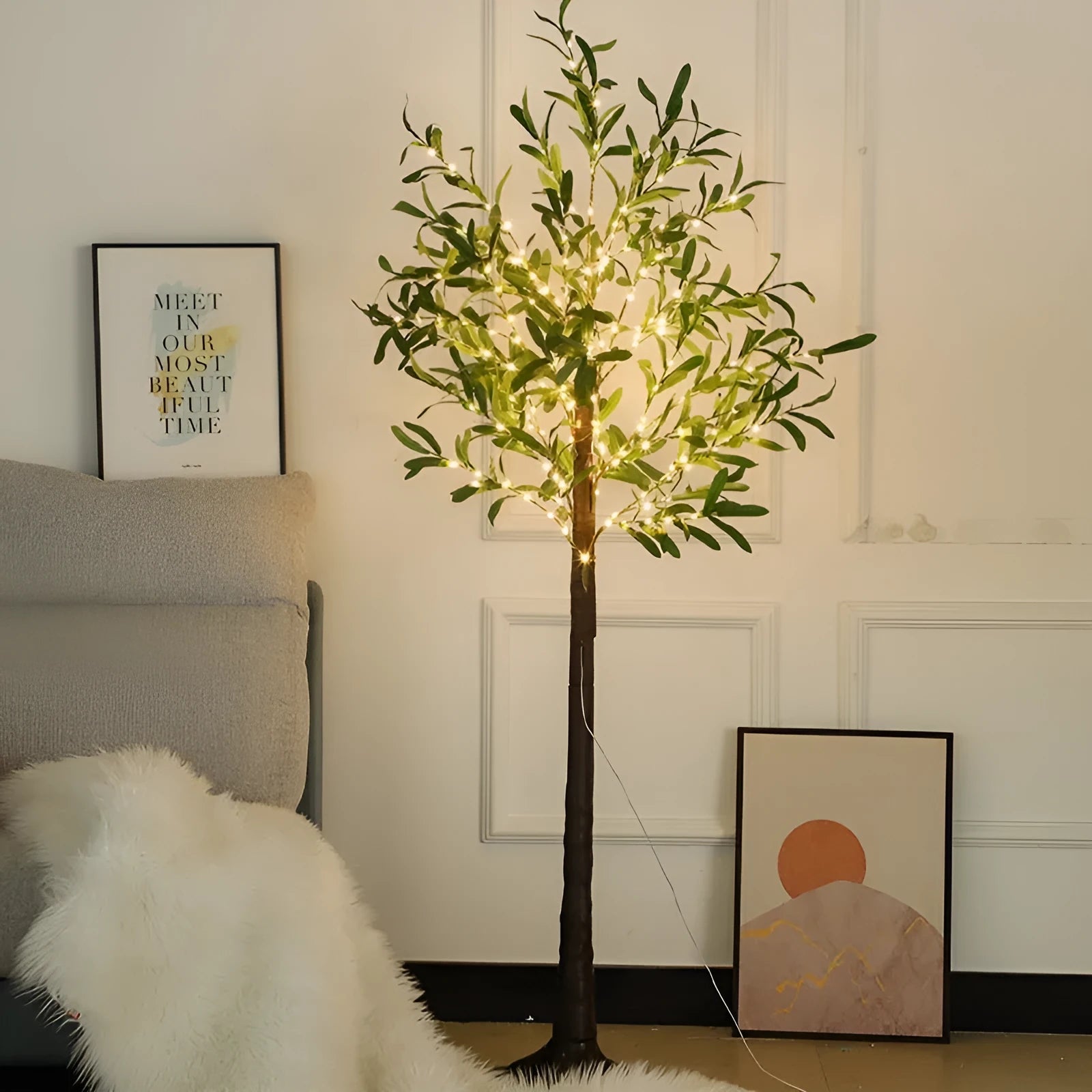 Tall 1.8 metre simulation olive leaf tree lamp with warm white LEDs lit, showing abstract trunk design.
