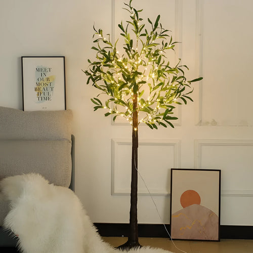 Tall 1.8 metre simulation olive leaf tree lamp with warm white LEDs lit, showing abstract trunk design.