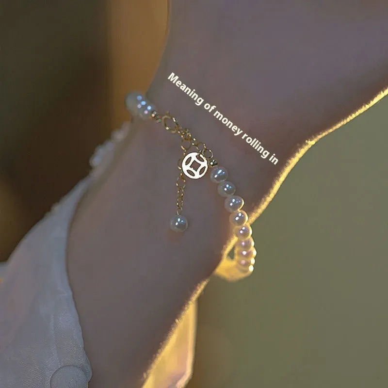 Chinese style glass bead bracelet with bamboo leaf design and manual craftsmanship details.