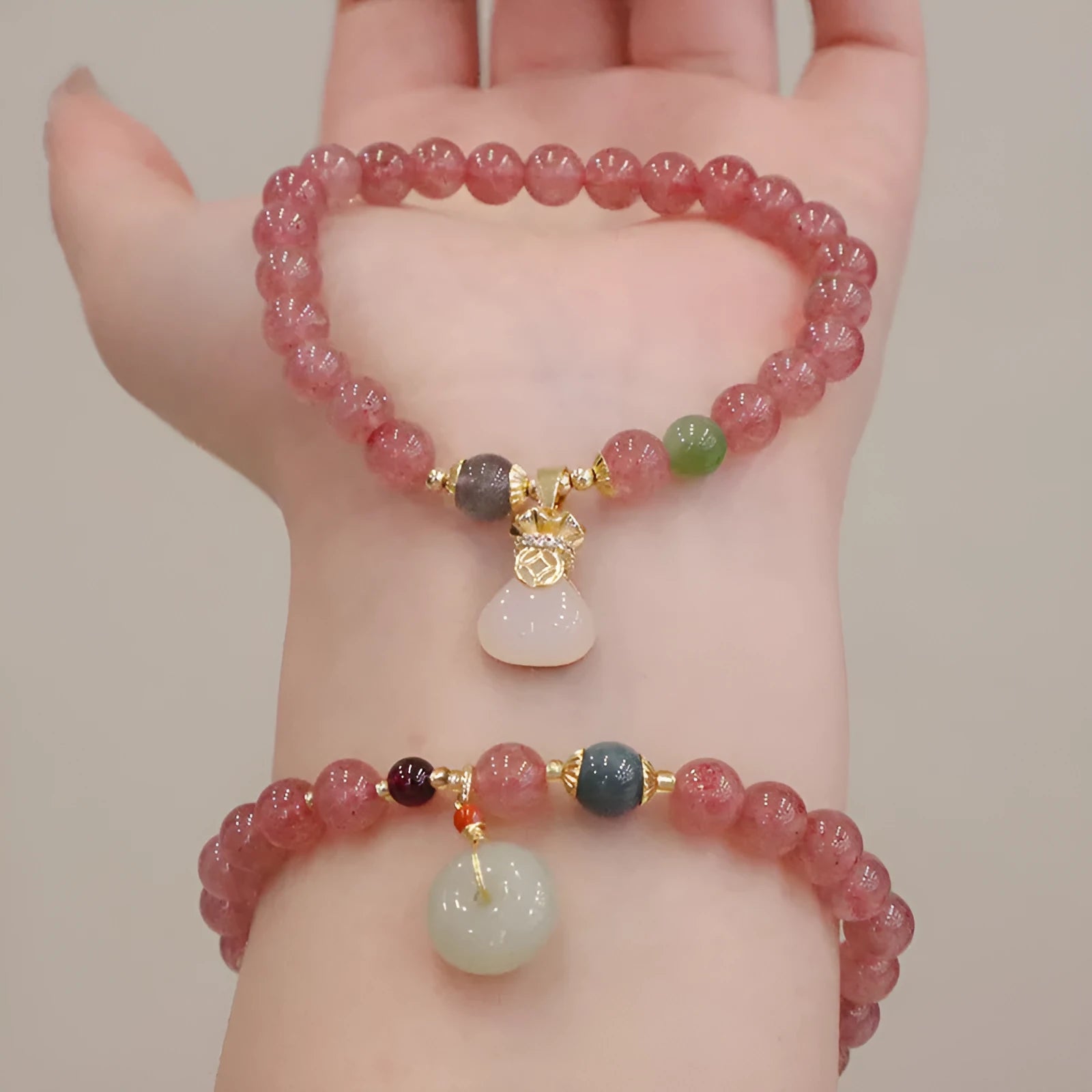 Geometric strawberry quartz women's bracelet with peace buckle and lucky bag decoration