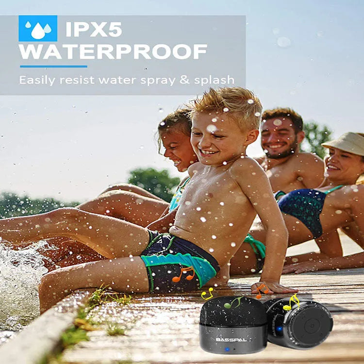 Black portable mini waterproof Bluetooth speaker with button controls.