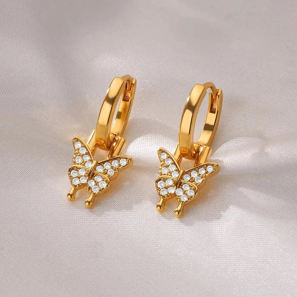Women's irregular geometric butterfly earrings with copper construction and heart, bow, star elements