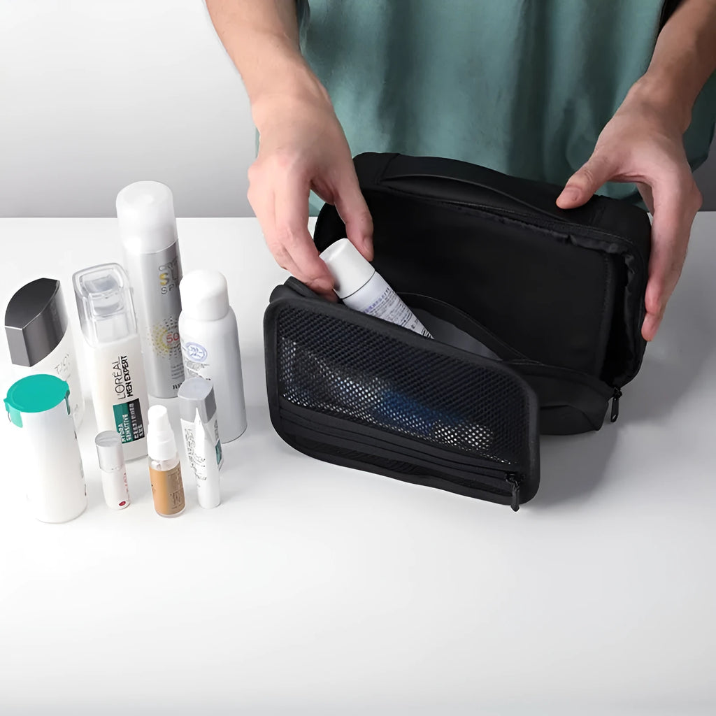 Men's portable Oxford cloth toiletries bag with wet dry separation compartments in graphite gray.