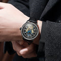 Men's stainless steel mechanical watch with a round dial and transparent case back on a rose gold strap.