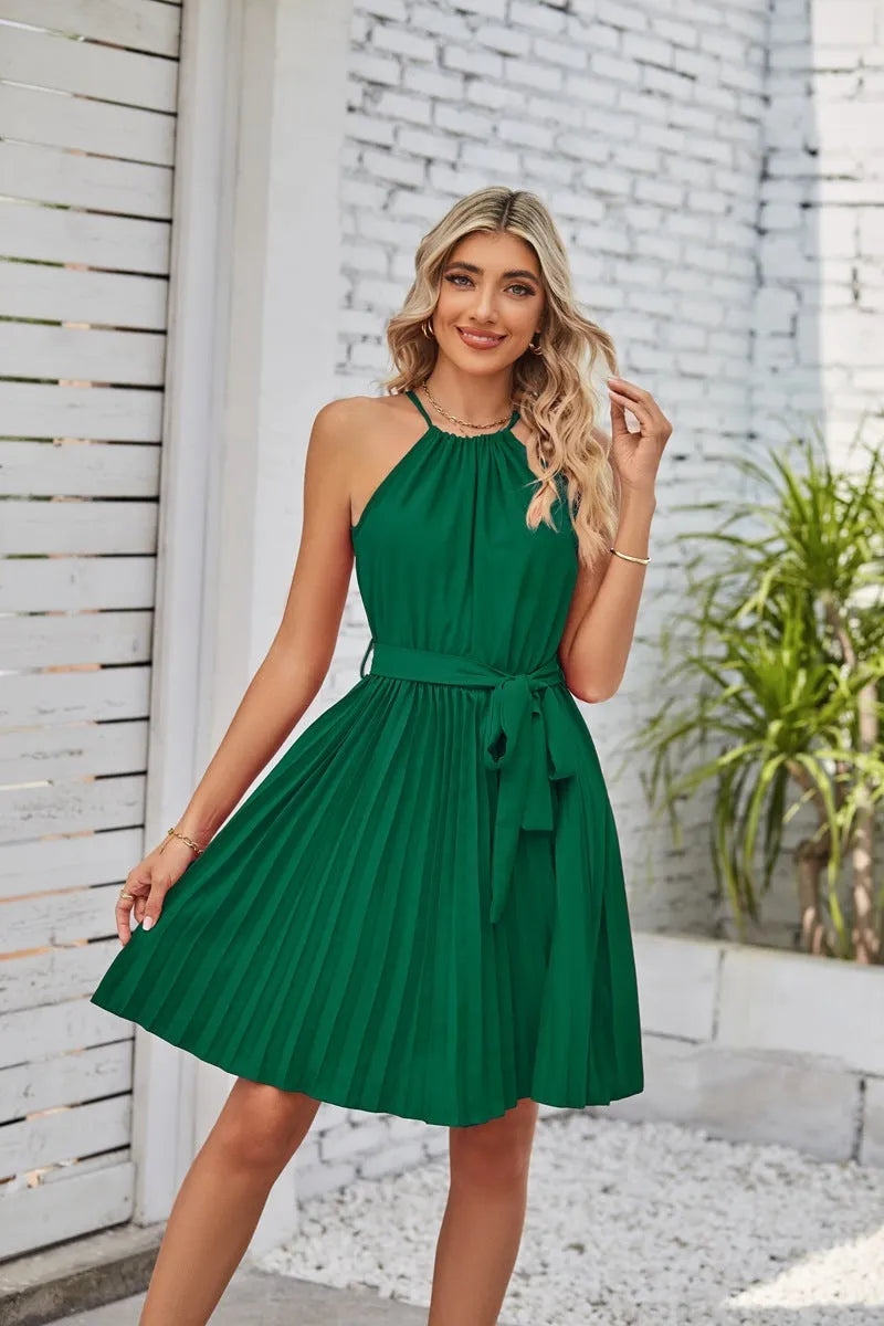 Women's black chiffon halter dress with pleated midi skirt and adjustable waist belt.