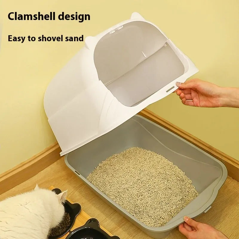 Oversized enclosed PP cat litter box with lid in grey colour, placed on floor