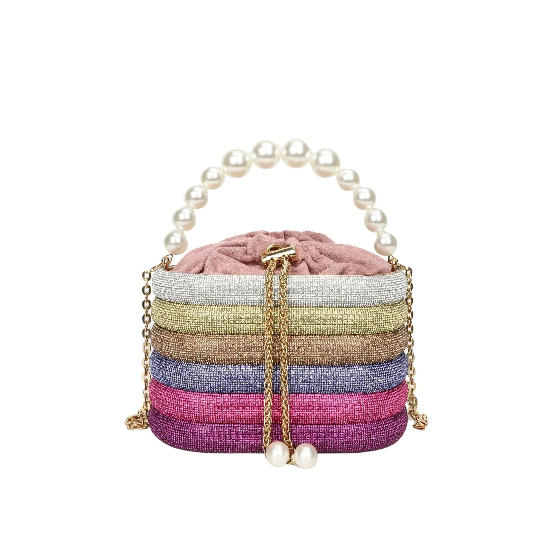 Women's black one-shoulder crossbody bag with pearl beading on the front.
