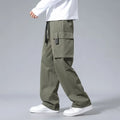 Boys straight leg cargo pants in army green with large pockets and a drawstring waist.