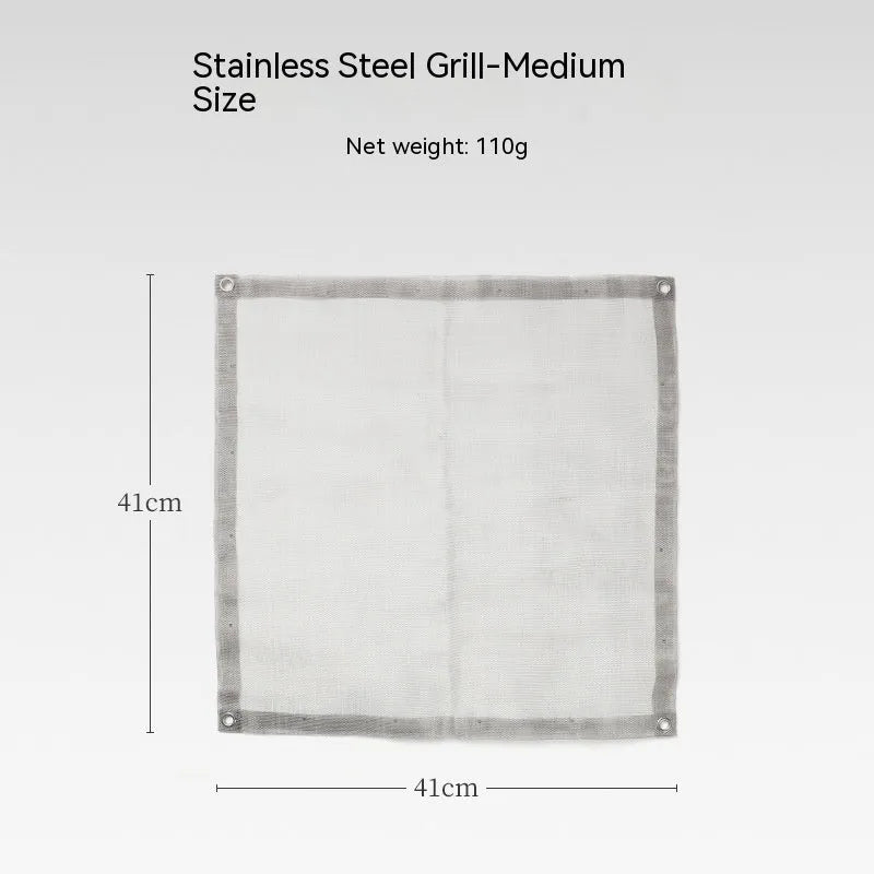 Large stainless steel barbecue with integrated silver grill net for outdoor cooking