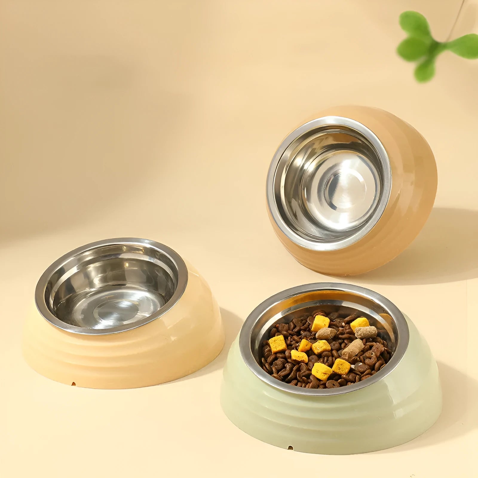 Stainless steel cat bowl with coloured plastic base in choice of light green, beige or brown
