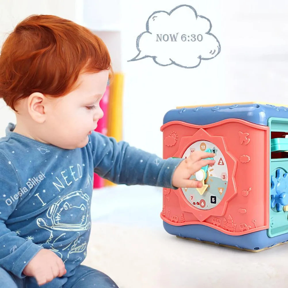 Colourful six-sided baby activity cube with bead maze, clock, and car game panels.