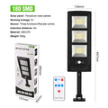 Plastic solar-powered remote control LED street light for outdoor wall or garden installation.