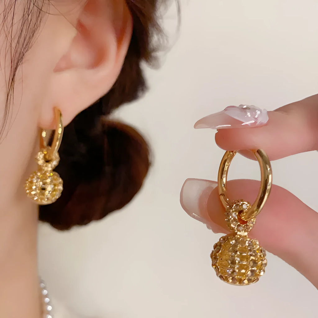 Coffee colour full diamond hollow ball ear clips with real gold plating on copper, round geometric design, 1 pair