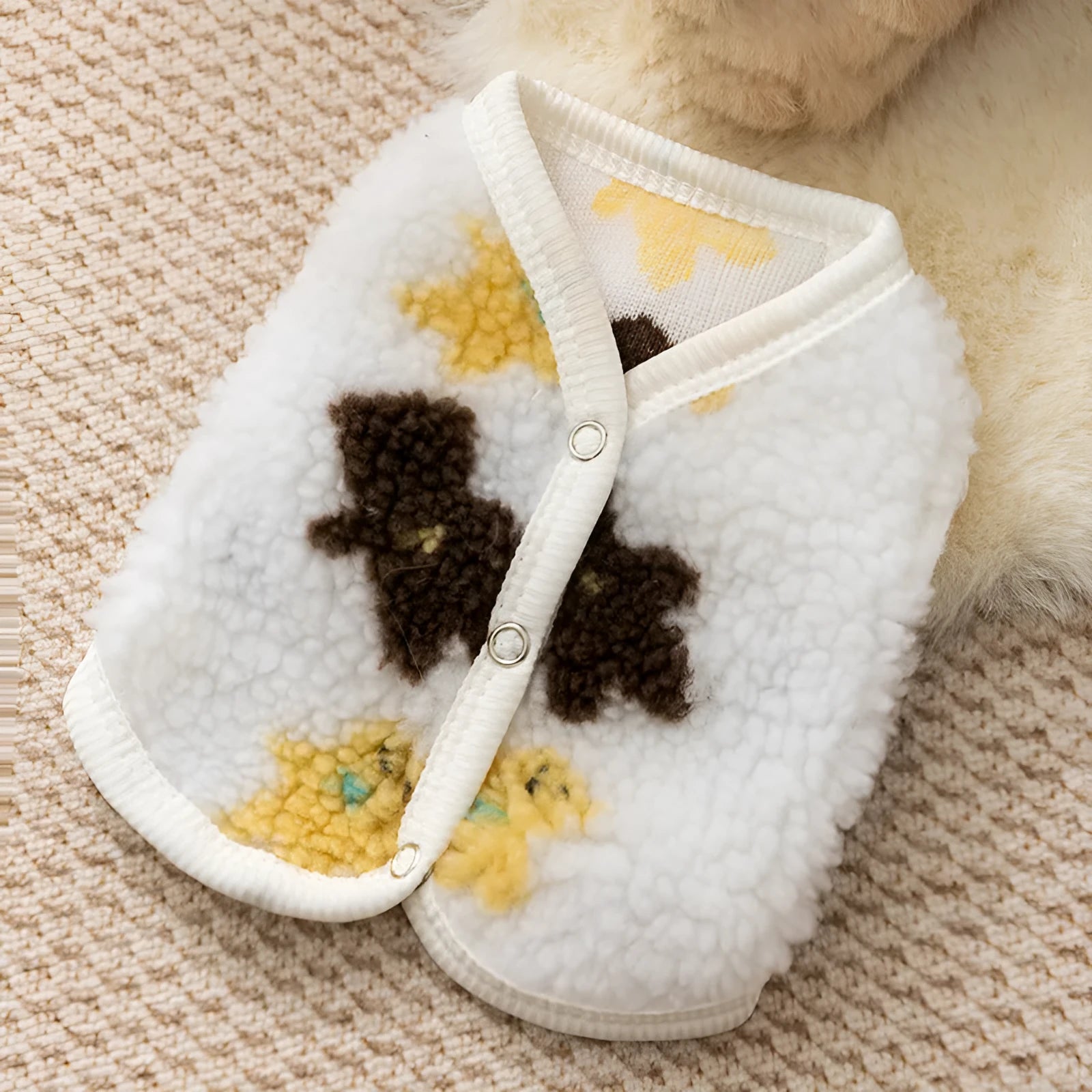 White teddy bear printed Sherpa fleece dog vest with QQ button closure for small and medium pets