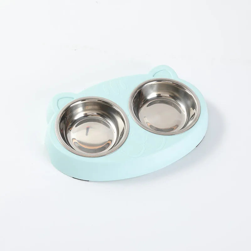 Macaron-shaped plastic pet feeder tray with two bowls in blue, green, or pink colour options