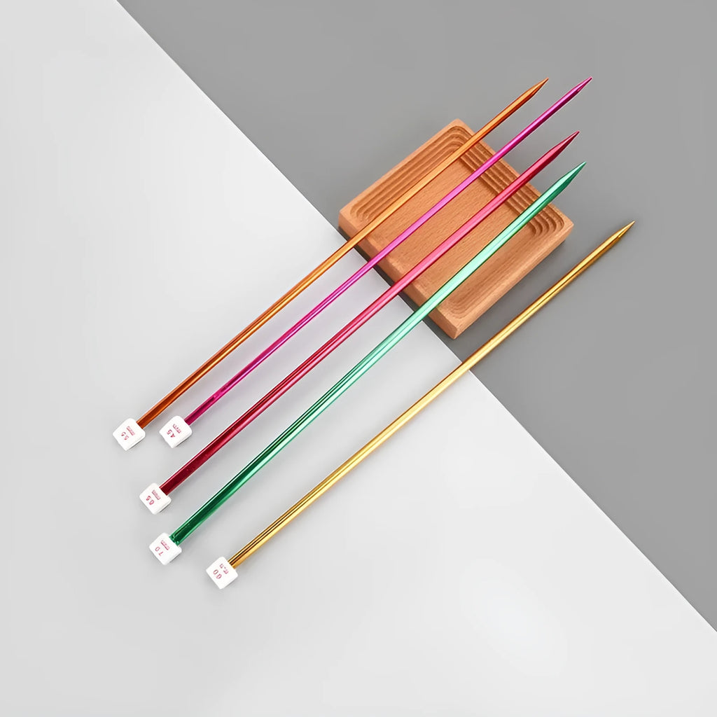 Set of lengthened crochet hooks with protective end caps in sizes from 2.0mm to 10.0mm.
